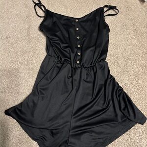 Elegant Black romper with buttons